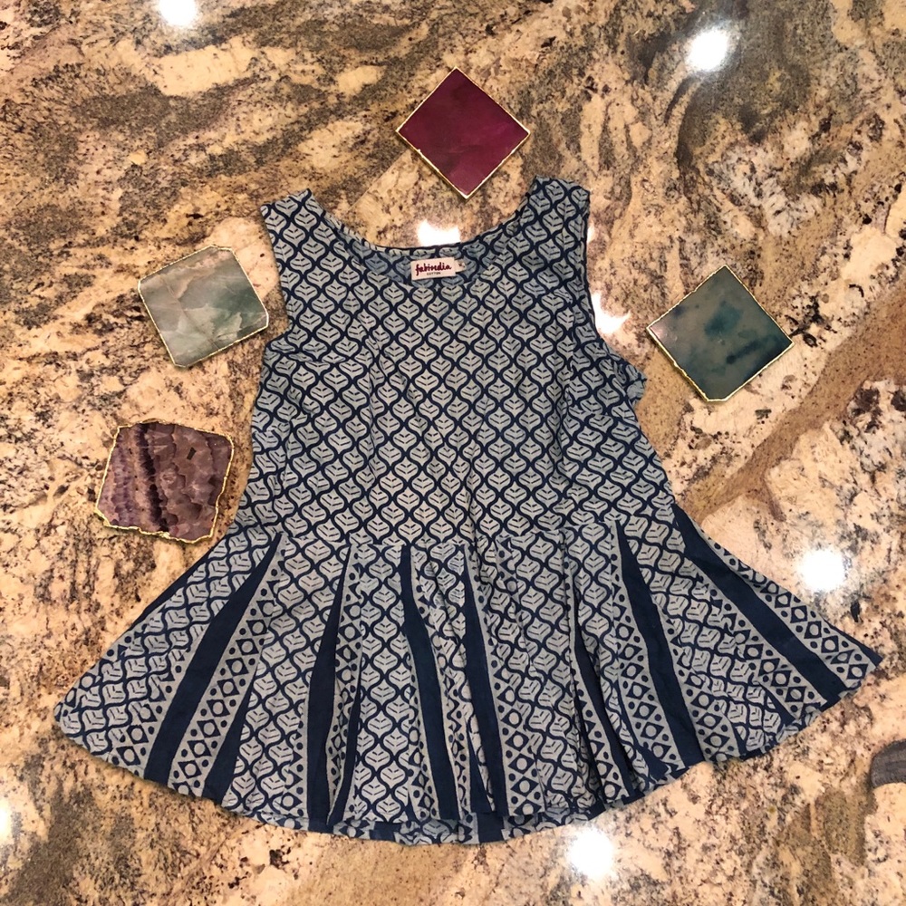 Blue patterned tank top flared at bottom